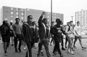 A group of USM students protest on campus during a walkout.