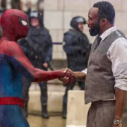 Spider-Man )Tom Holland) shaking Bill Metzger's (Tramell Tillman) hand in Spider-Man: Brand New Day.