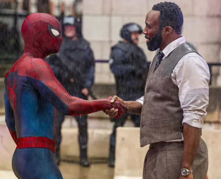 Spider-Man )Tom Holland) shaking Bill Metzger's (Tramell Tillman) hand in Spider-Man: Brand New Day.